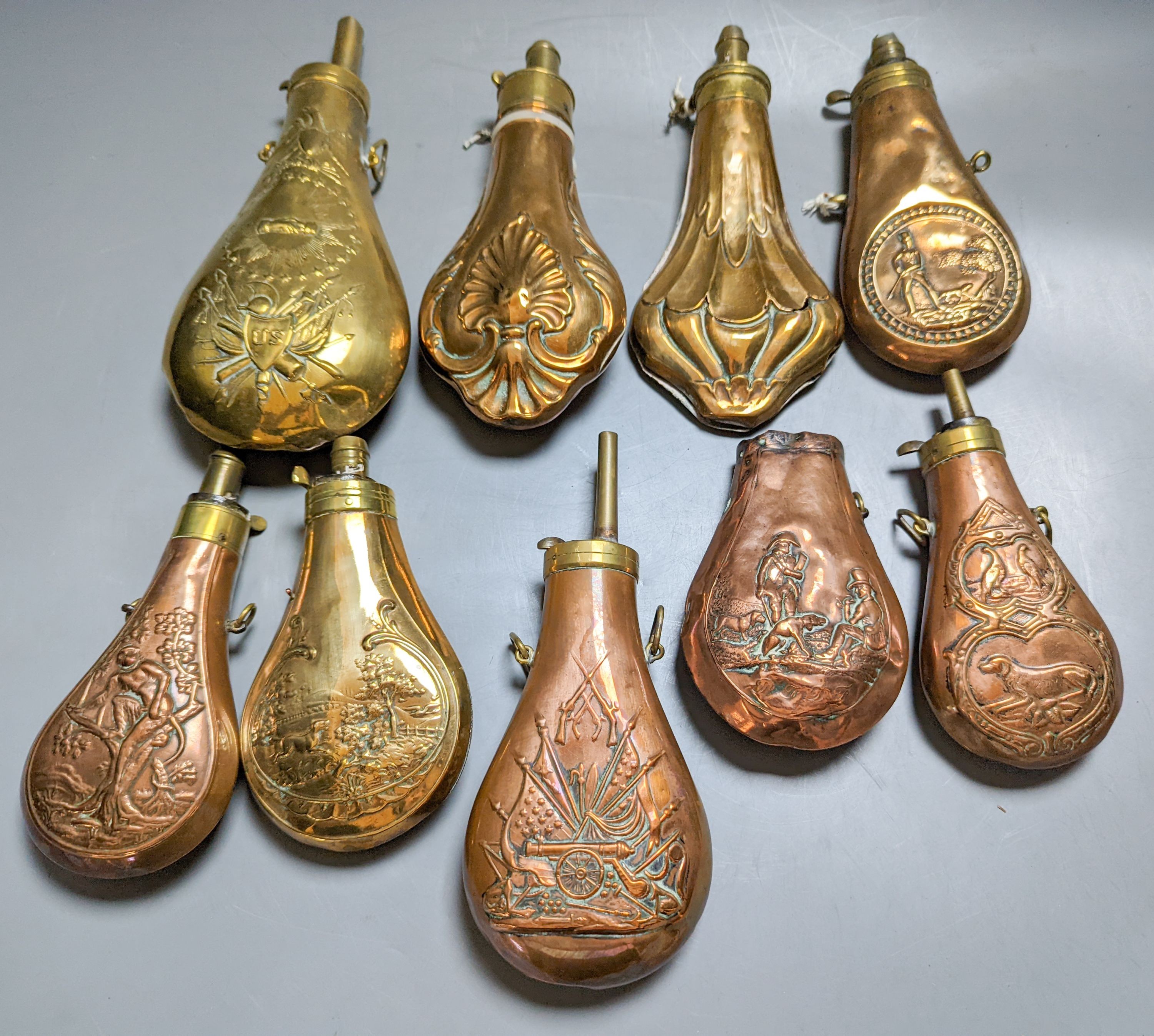 Nine assorted 19th century copper shot flasks